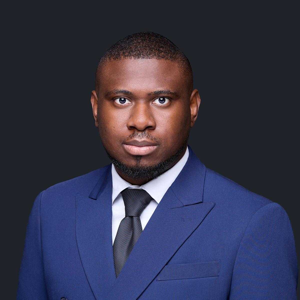 Emmanuel Oyesomi, founder and family lawyer at Redstone Family Law in Red Deer